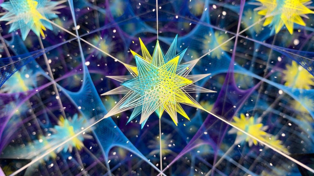 a star in the middle of a blue and yellow background