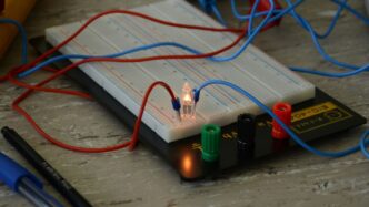 green and orange electric wires