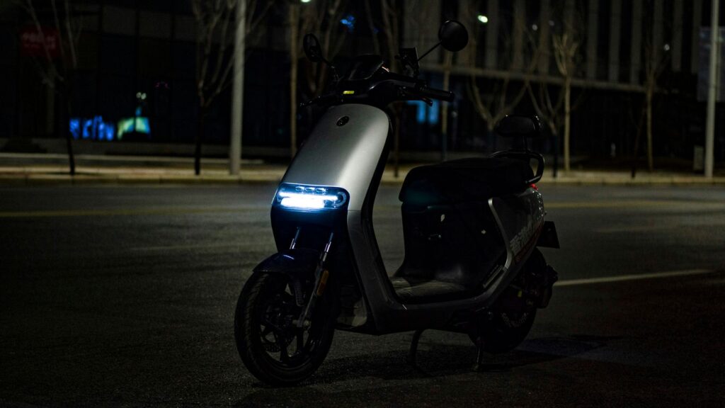 black and gray motorcycle on road during night time