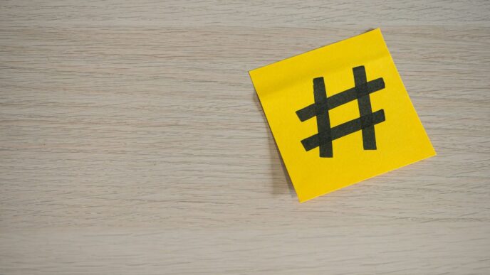 a yellow piece of paper with a hash symbol on it