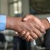 two people shaking hands