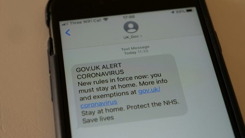 a cell phone with a text message on the screen