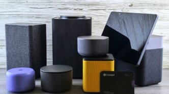 Collection of modern electronic devices and speakers.