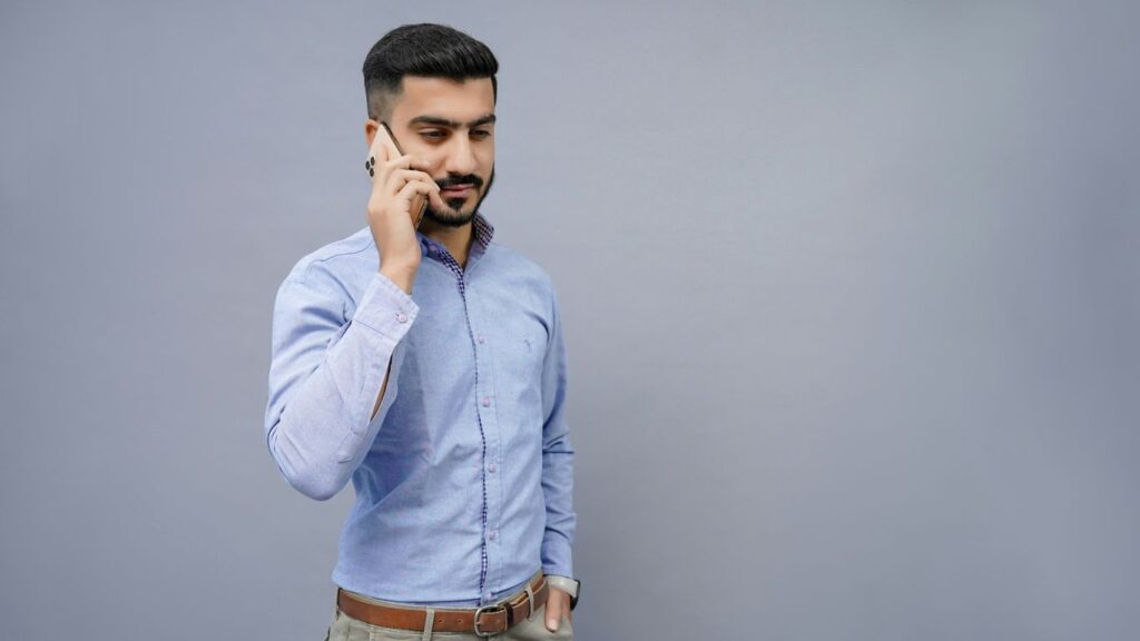 a person talking on a cell phone