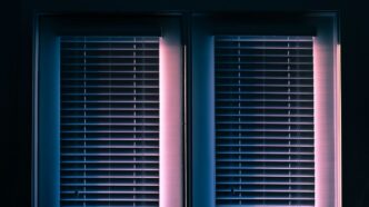 white window blinds closed