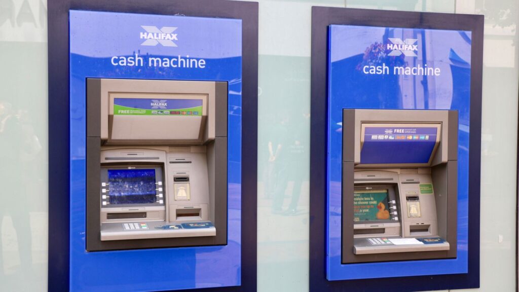 two blue and black Halifax Cash Machines