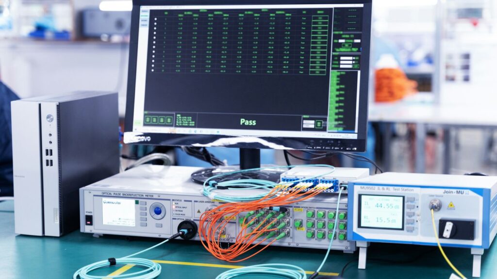 a computer monitor sitting on top of a table