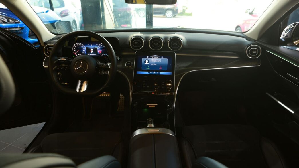 the interior of a car with a dash board and steering wheel