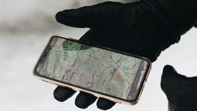 person holding iphone 6 with case