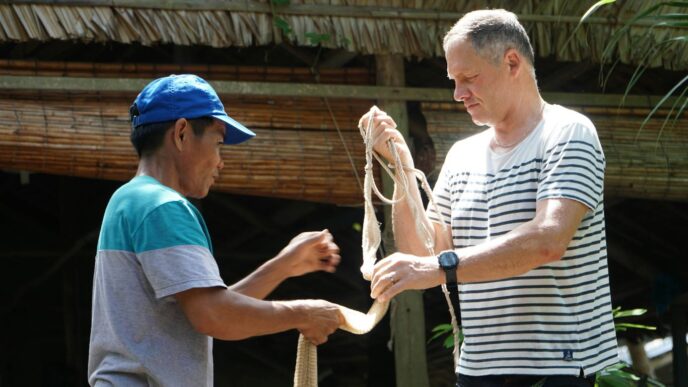 a man shaking hands with another man