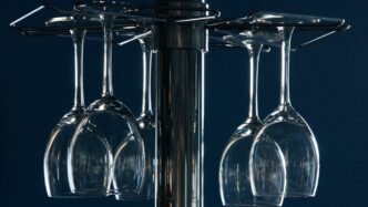clear wine glasses on black table