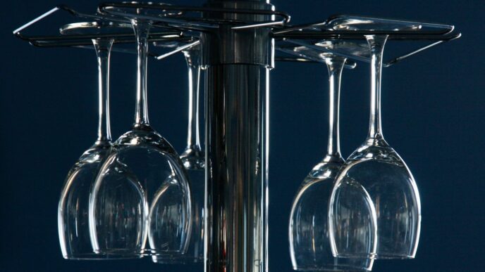 clear wine glasses on black table