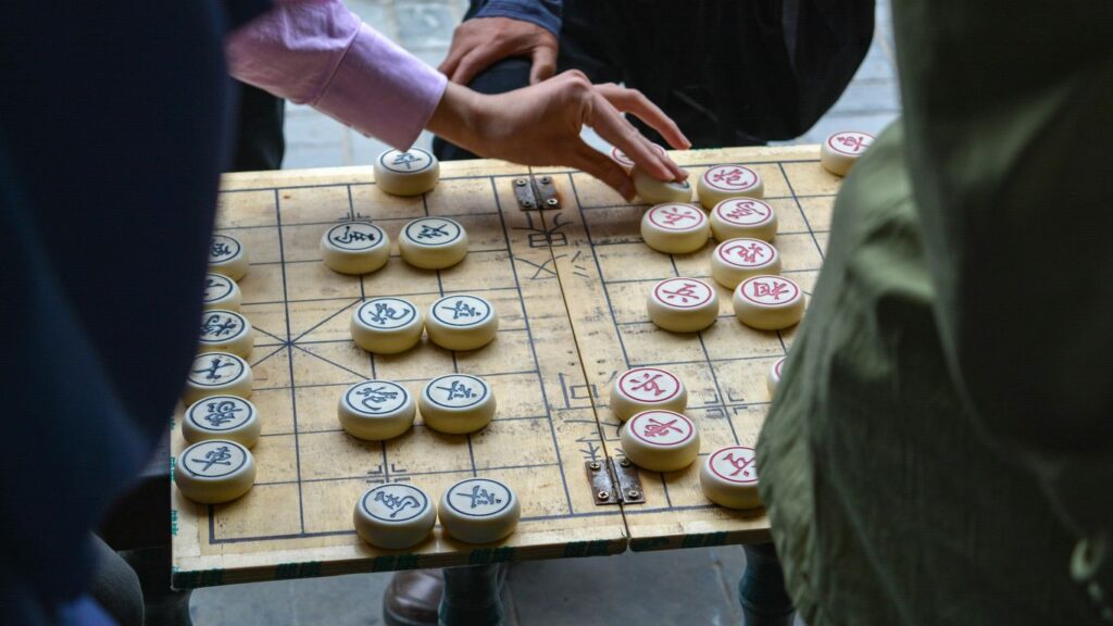 person playing board game