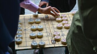 person playing board game