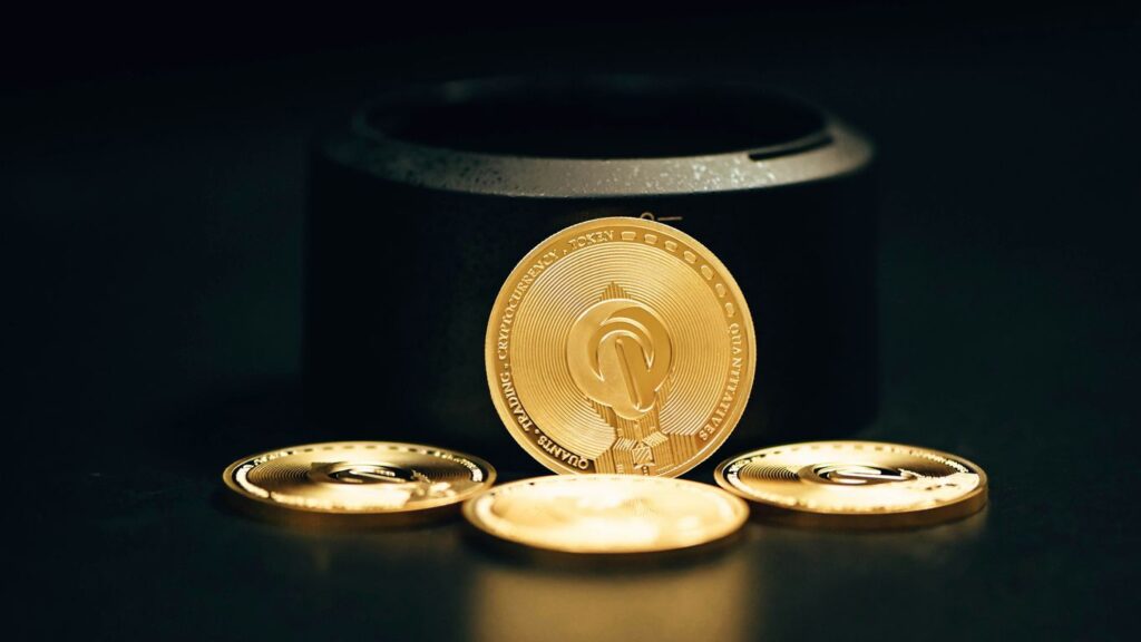 a gold coin sitting on top of a black table