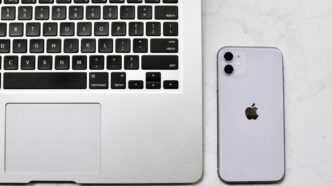 silver iphone 6 on macbook