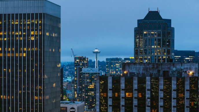 a view of a city at night from the top of a building