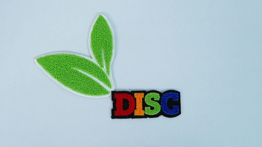A green leaf with the word disc on it