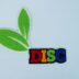 A green leaf with the word disc on it