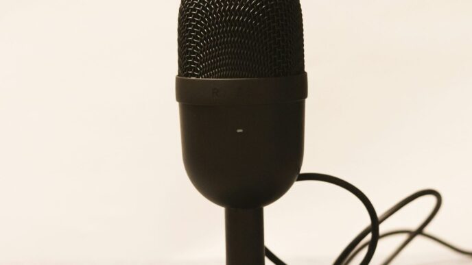 a microphone is plugged into a charger