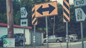 a street sign is posted on a pole