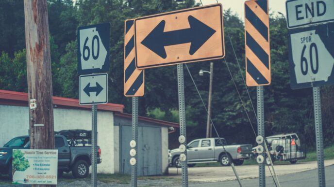 a street sign is posted on a pole