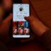 A person holding a cell phone with multiple pictures on the screen