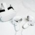 a pair of white ear buds