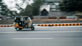 a person driving a small vehicle