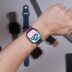 Person wearing smartwatch with iphones and bands