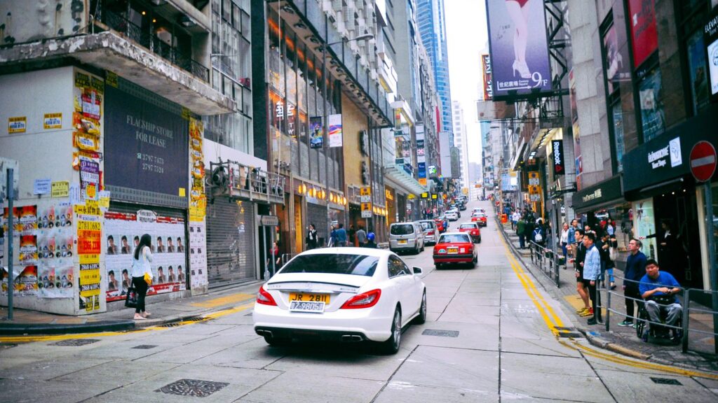 photo of cars on street during daytime