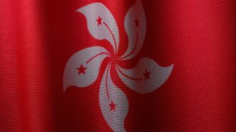 a close up of a red and white flag