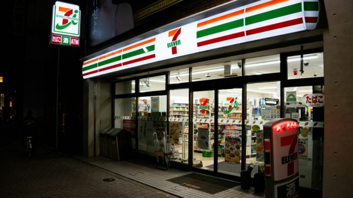 A brightly lit 7-eleven store at night