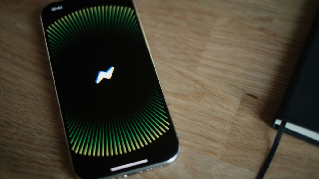 A close up of a cell phone on a table