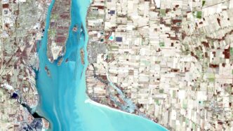 aerial view of a river and city