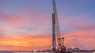 orange and white tower crane