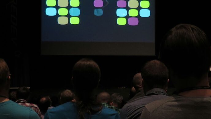 people near projector canvas