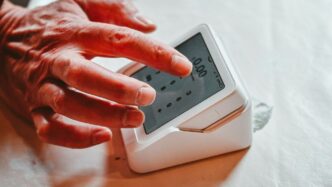 a person holding a device