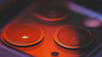 orange and black game controller