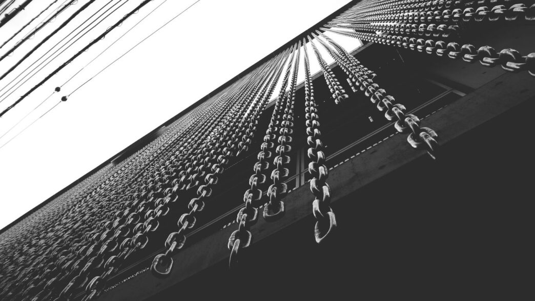 black and white photo of a high rise building