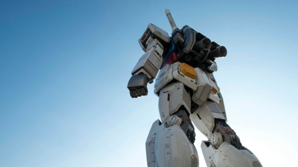 white and red robot statue