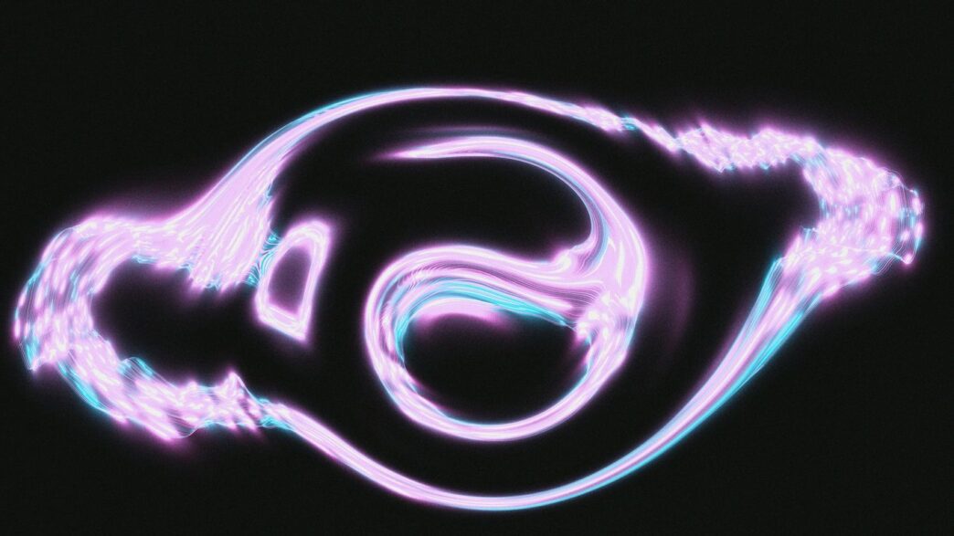 Abstract swirling light patterns on black background
