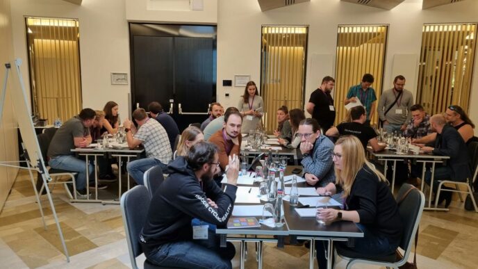 a group of people sitting around a table