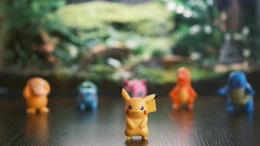 Pikachu and other pokemon figures on a table.