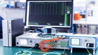 a computer monitor sitting on top of a table