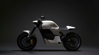 white and black motorcycle with black background