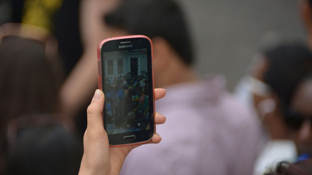 a person holding a cell phone