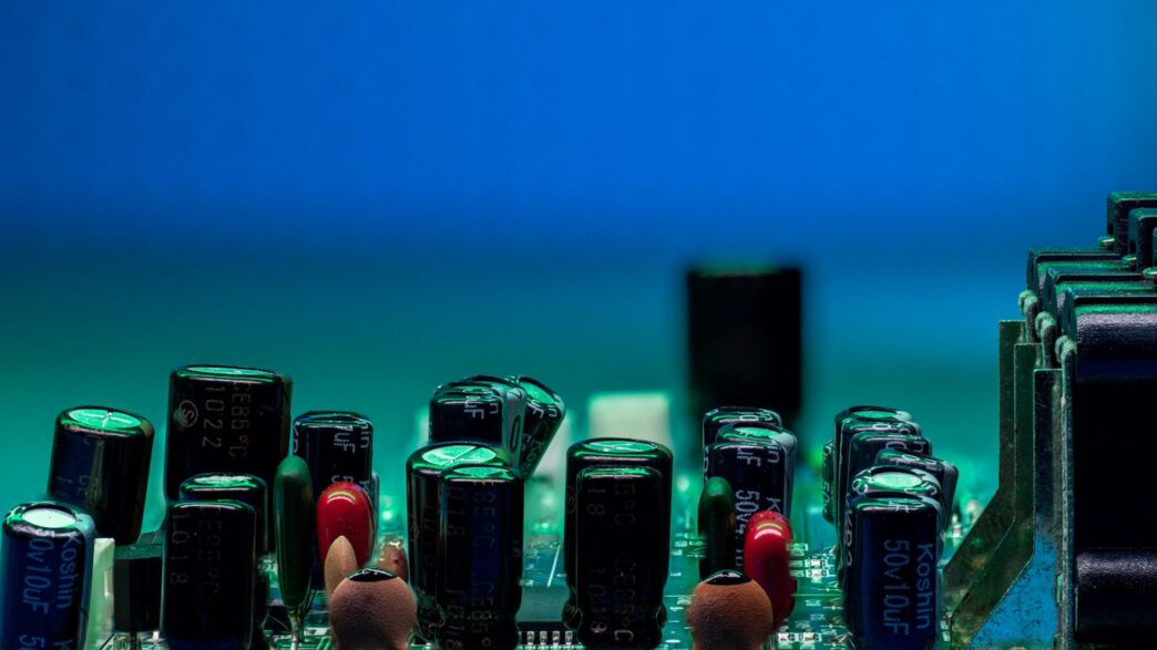 Circuit board filled with electronic components.