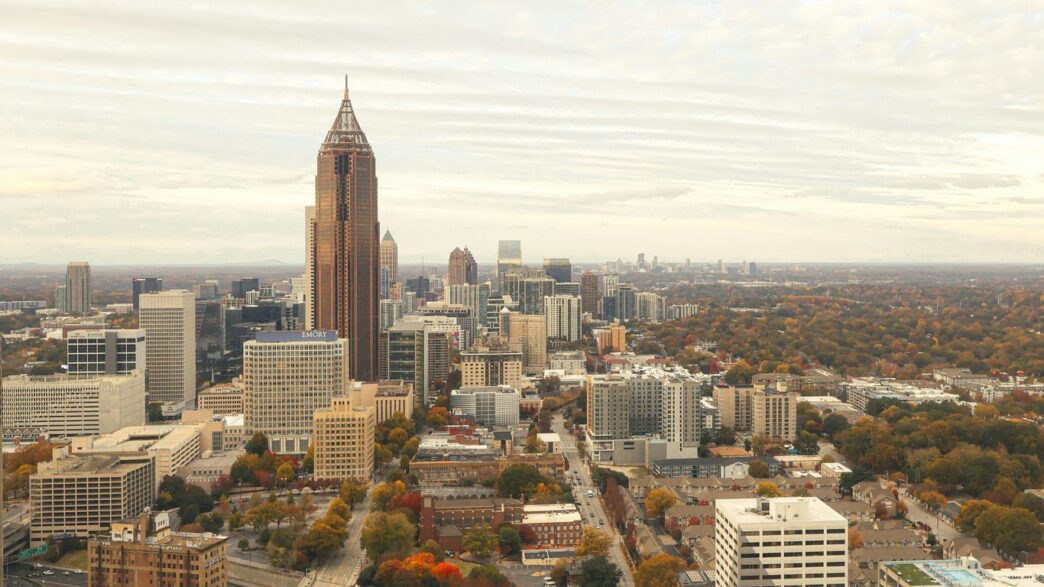 Tall buildings dominate a sprawling city skyline.