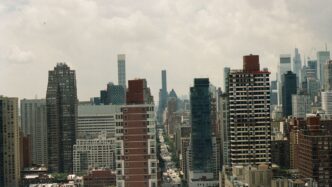 a view of a city with tall buildings